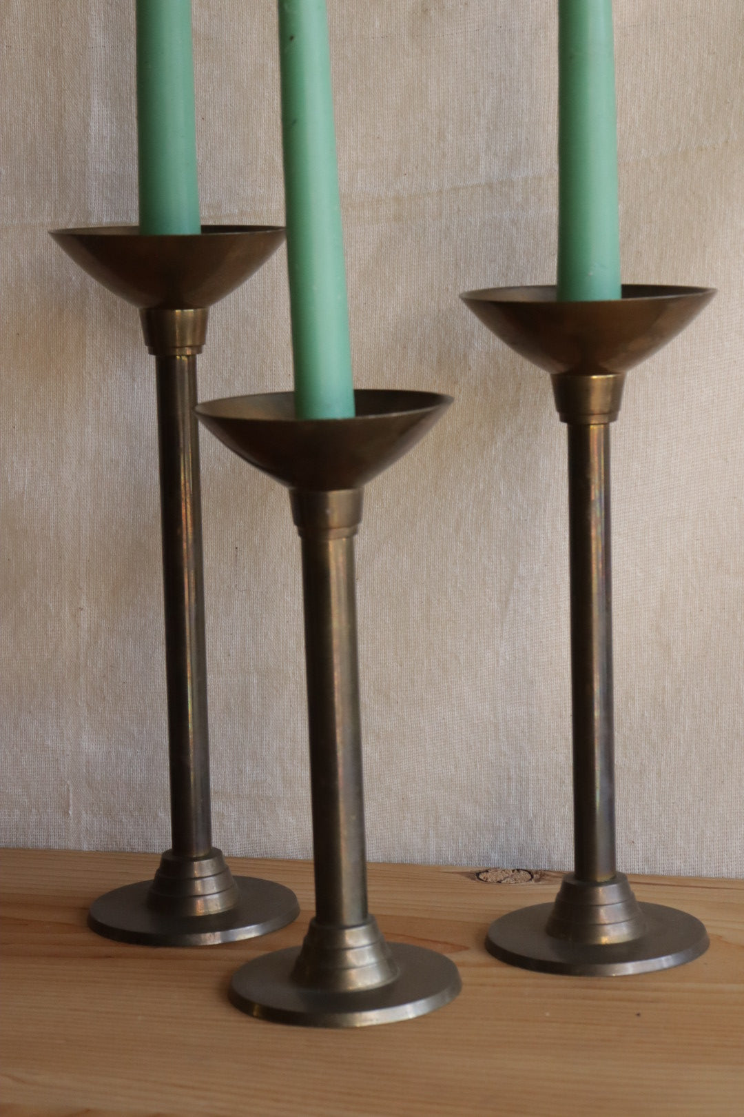 Brass candle holder trio